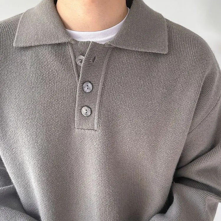 Grauer Pullover