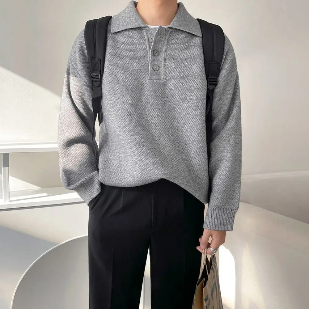 Grauer Pullover
