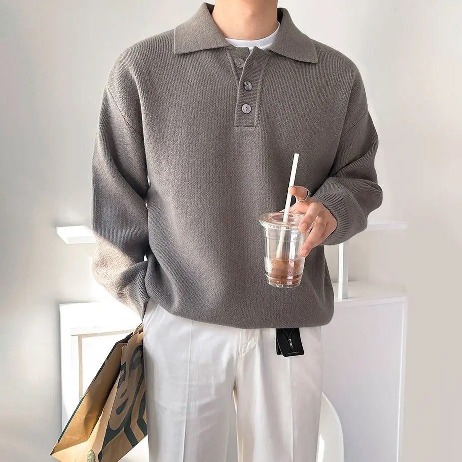 Grauer Pullover